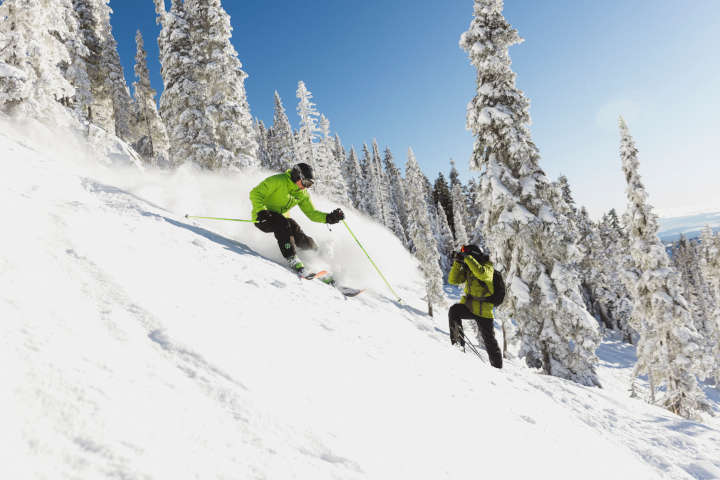 Skiers filming content