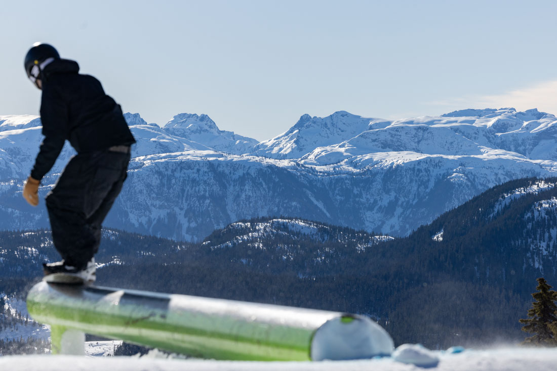 Skier styling a park feature