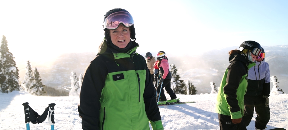 Jen with guests on a sunny day at Mount Washington